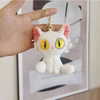 2023 Portachiavi giocattolo gatto bianco/nero imbottito in peluche personalizzato della nuova serie di cartoni animati